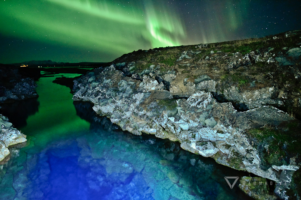 Aurora Borealis dancing above the Silfra Ravine in Thingvellir.